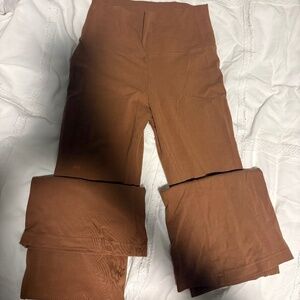 Aritzia TNA Flare Leggings — Size S